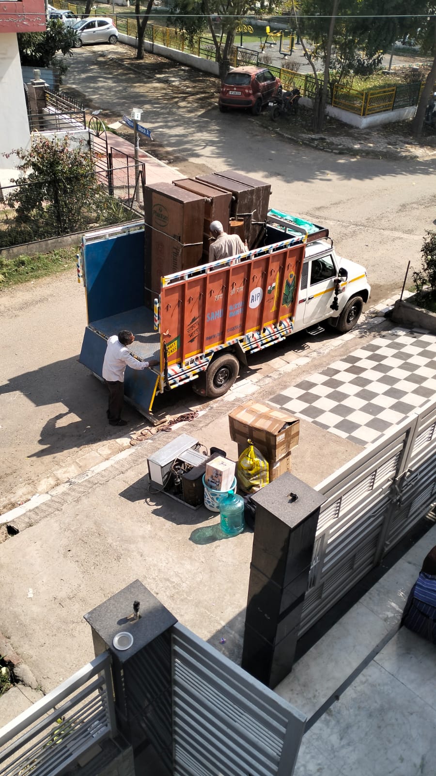 Household furniture being loaded into a moving truck
